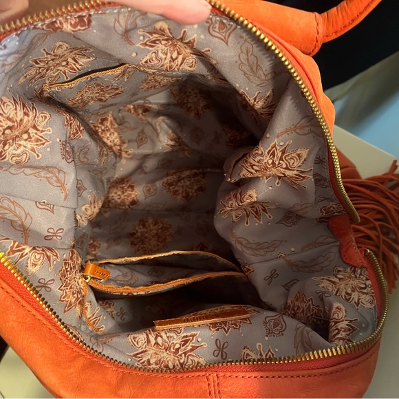 Lava colored leather hobo bag with a tassel. Perfect for summer and fall. - Picture 3 of 3